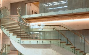 UCSD Center for Novel Therapeutics interior glass staircase railing