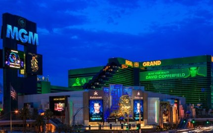 Exterior view of Hakkasan with the lion statue in front and MGM Grand in the background. 