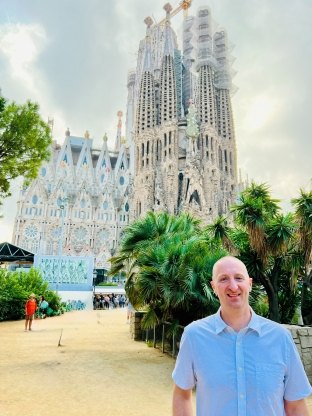 Dan in front of La Sagrada Familia, his favorite building in the world