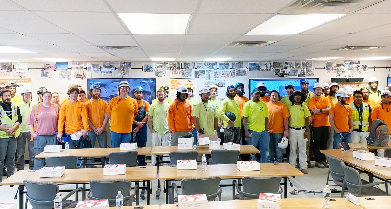 Construction workers in a classroom