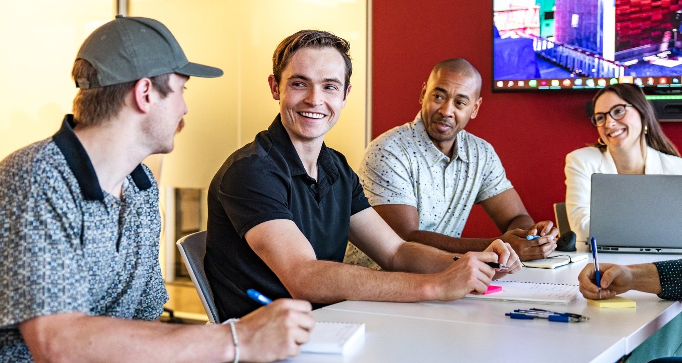 Group of people gathered around a table 