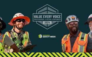 Four people surrounding the Construction Safety Week logo