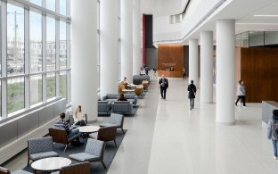 People walking in a large lobby area