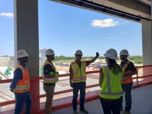 Group of people on a jobsite tour.