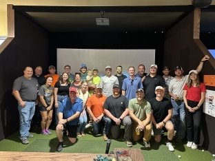 Group of people at a team building activity.