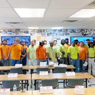 workers in a classroom setting